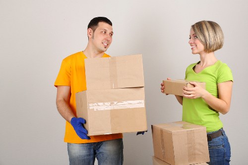 Professional movers handling furniture during an Eastbedfont house move